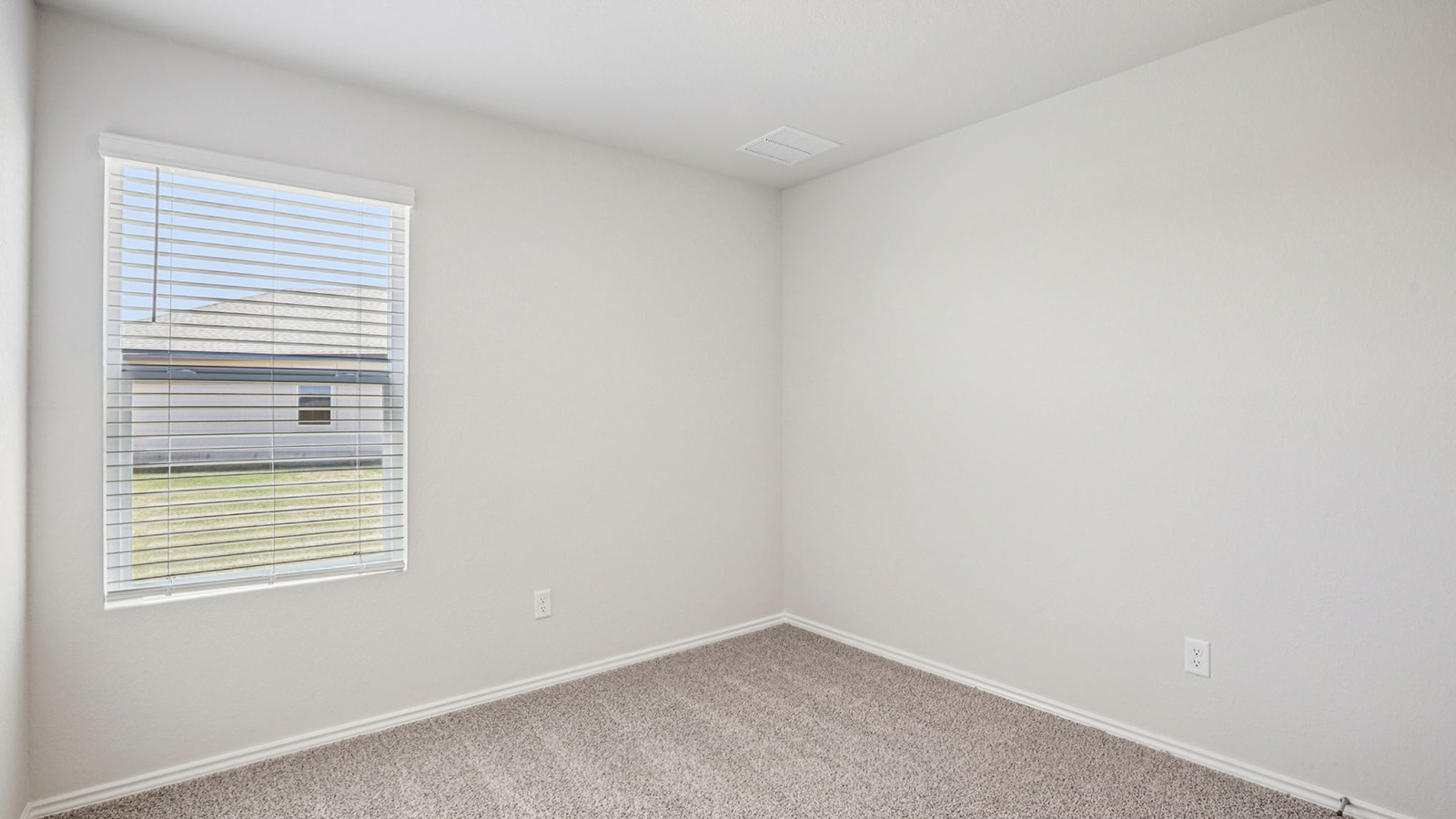 148 Wyatt Way Jarrell, TX 76537 - Photo 26 of 33 Neutral wall paint with carpet flooring