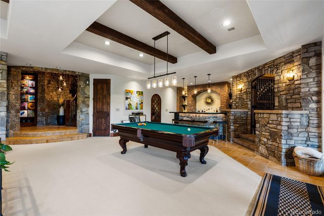 a room with lots of furniture and windows