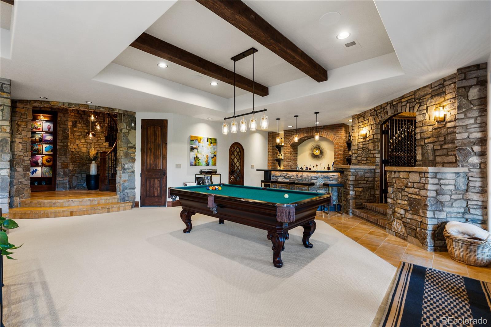 7208 Raphael Lane Littleton, CO 80125 - Photo 28 of 47 a room with lots of furniture and windows