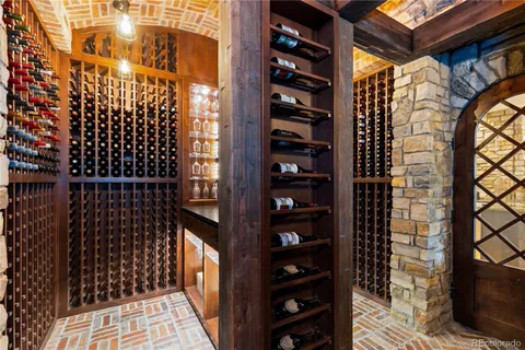 a view of balcony with wooden floor and windows