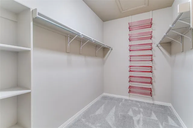 a view of a staircase and white walls