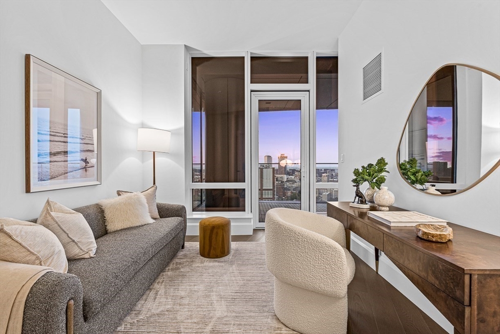 40 Trinity Place, Unit PH34D Boston, MA 02116 - Photo 20 of 37 a living room with furniture