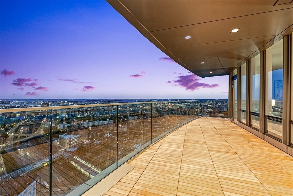 40 Trinity Place, Unit PH34D Boston, MA 02116 - Photo 34 of 37 a view of swimming pool with a table and chairs