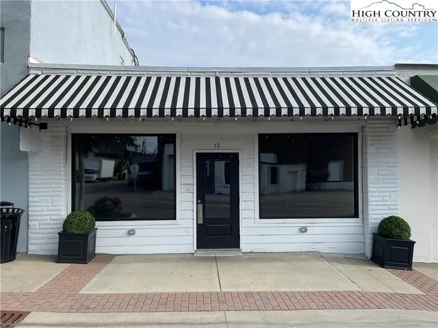 a view of a house with entryway and a potted plant