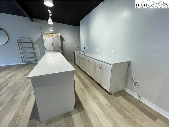 a view of a hallway with staircase