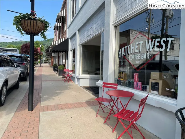 a view of a chairs and tables in the patio