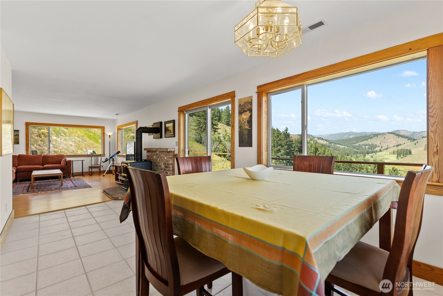 427 Rendezvous Road Winthrop, WA 98862 - Photo 16 of 40 a view of a dining room with furniture window and outside view