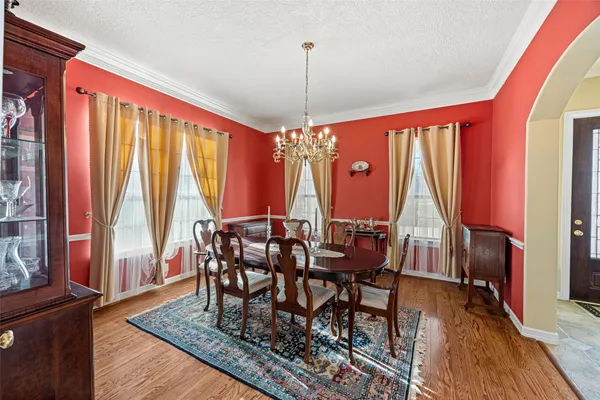 a lobby with furniture and wooden floor