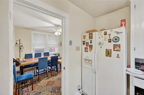 a room with furniture a rug and a closet