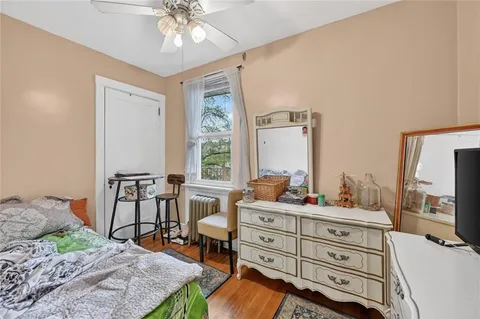 a bedroom with a bed and furniture