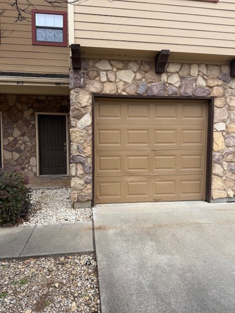 2410 2nd Street South, Unit 416 Waco, TX 76706 - Photo 2 of 40 a front view of a house with garage