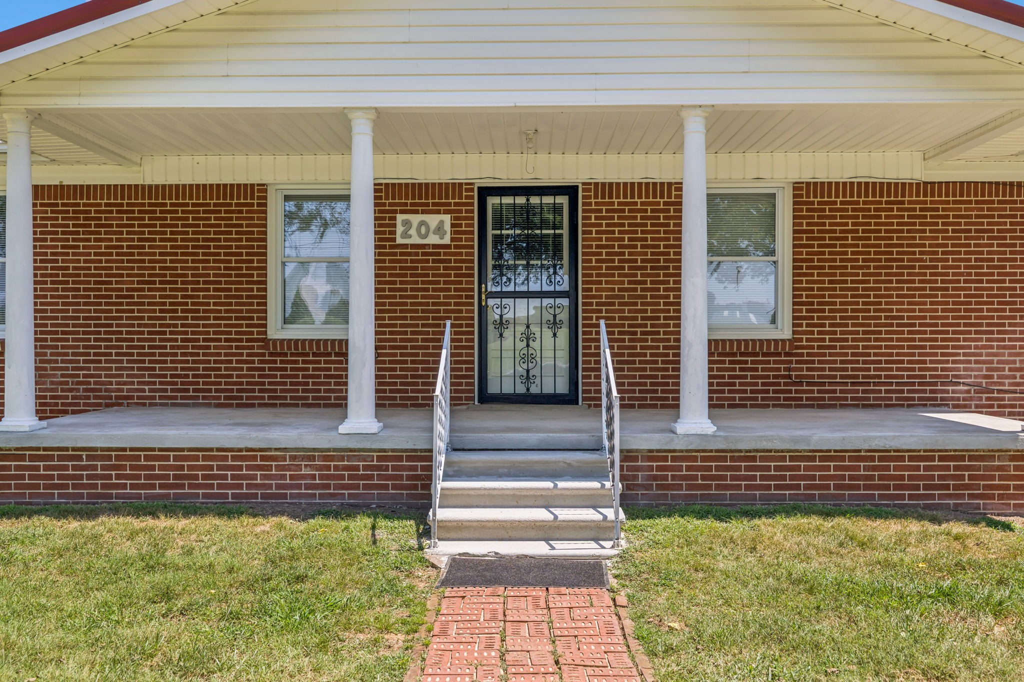 204 Canaan Road Mount Pleasant, TN 38474 - Photo 12 of 49 a front view of a house with a window