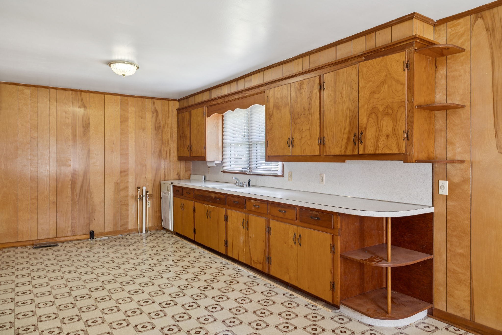 204 Canaan Road Mount Pleasant, TN 38474 - Photo 22 of 49 a kitchen with a sink cabinets and wooden floor