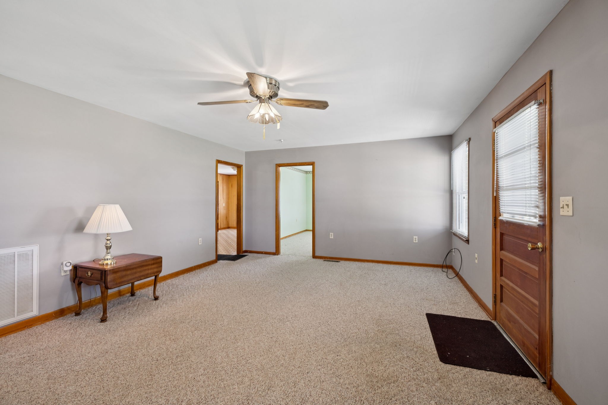 204 Canaan Road Mount Pleasant, TN 38474 - Photo 3 of 49 a view of an empty room with window and chandelier fan
