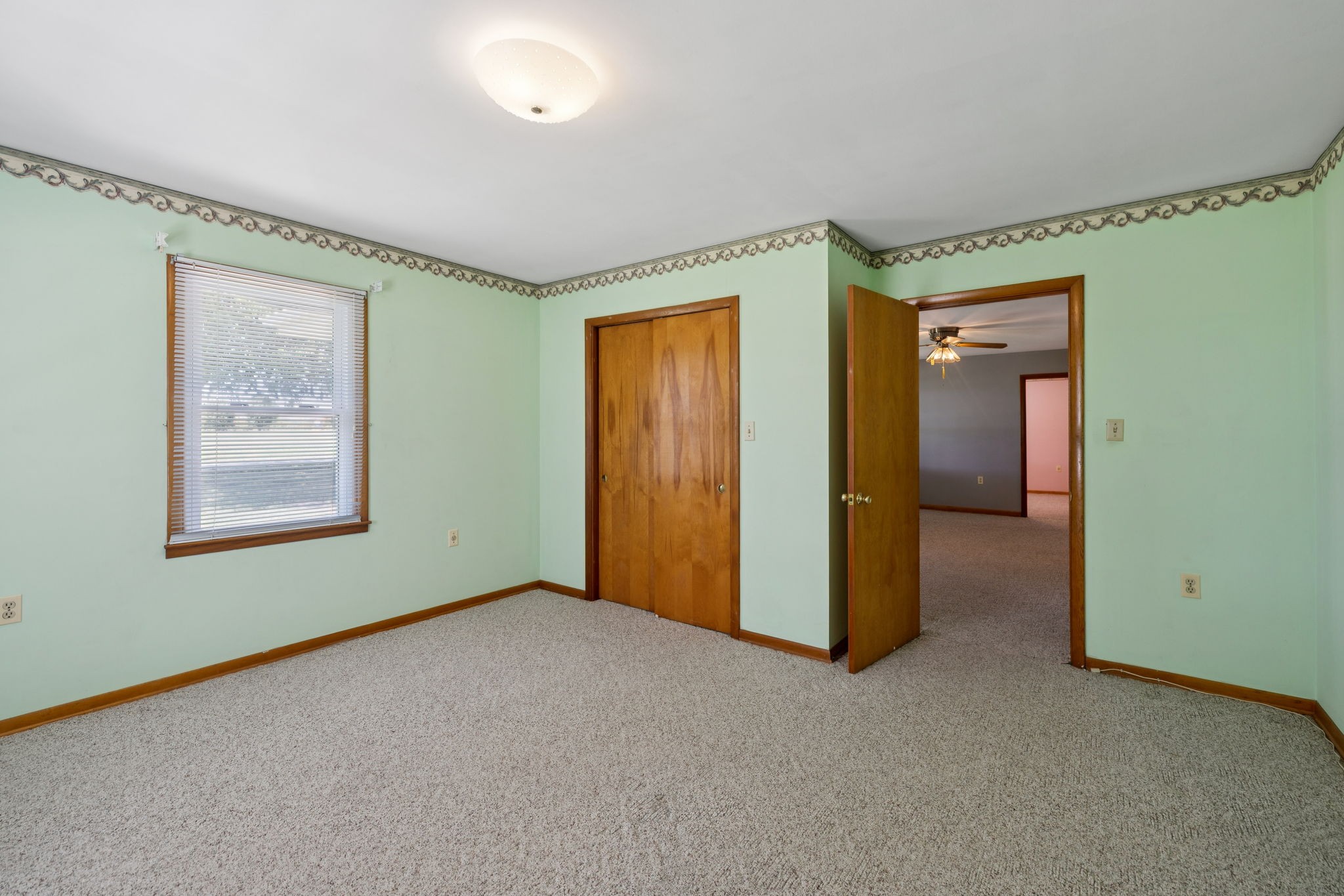 204 Canaan Road Mount Pleasant, TN 38474 - Photo 32 of 49 an empty room with windows and closet