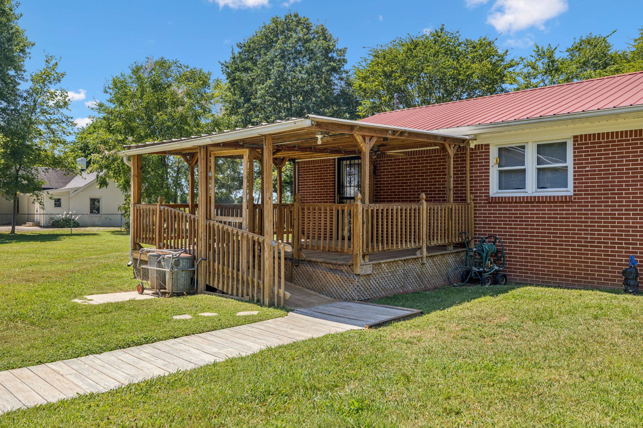 204 Canaan Road Mount Pleasant, TN 38474 - Photo 37 of 49 a view of a house with a yard