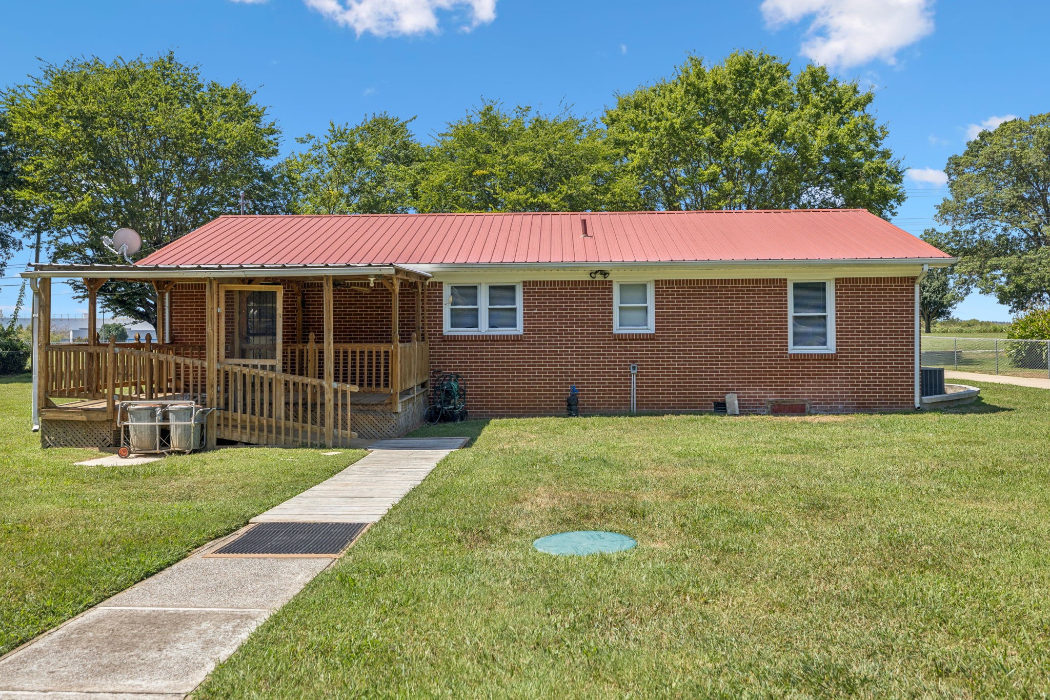 204 Canaan Road Mount Pleasant, TN 38474 - Photo 39 of 49 a view of a house with backyard and garden