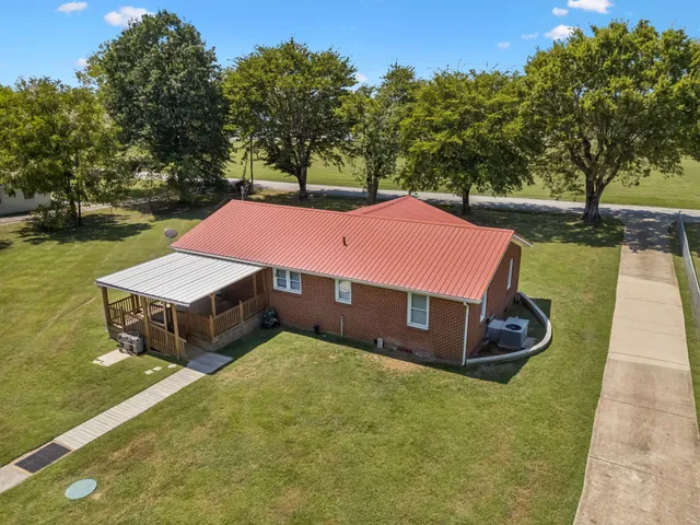 a view of a yard with an outdoor space