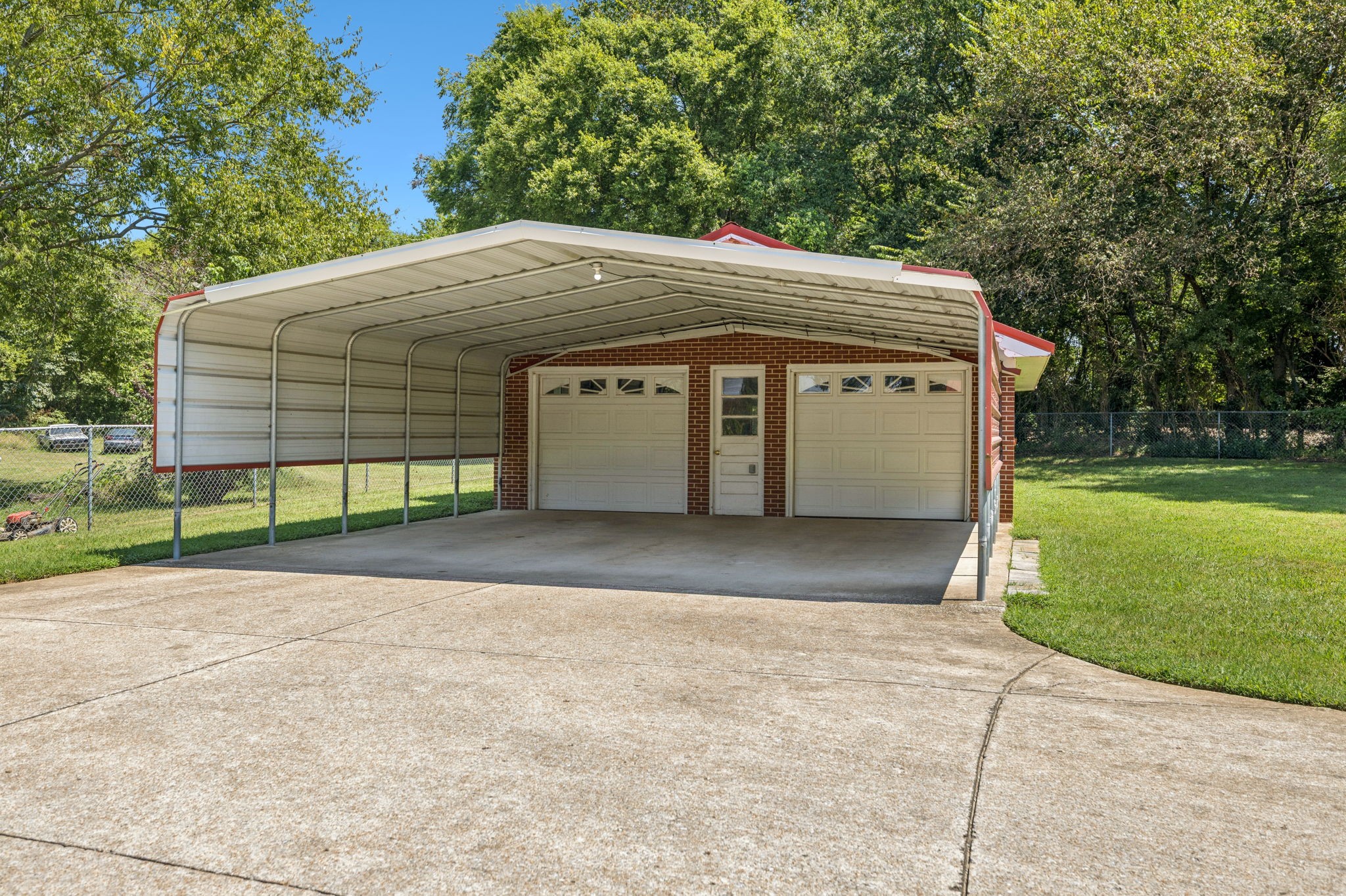 204 Canaan Road Mount Pleasant, TN 38474 - Photo 8 of 49 a view of backyard with a garage