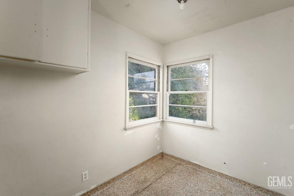 Undisclosed Address Bakersfield, CA 93305 - Photo 16 of 19 a view of an empty room with a window