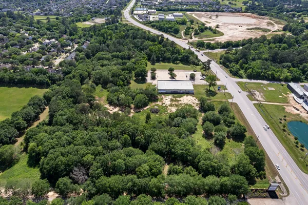 an aerial view of house with yard