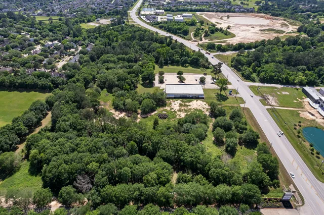 an aerial view of house with yard