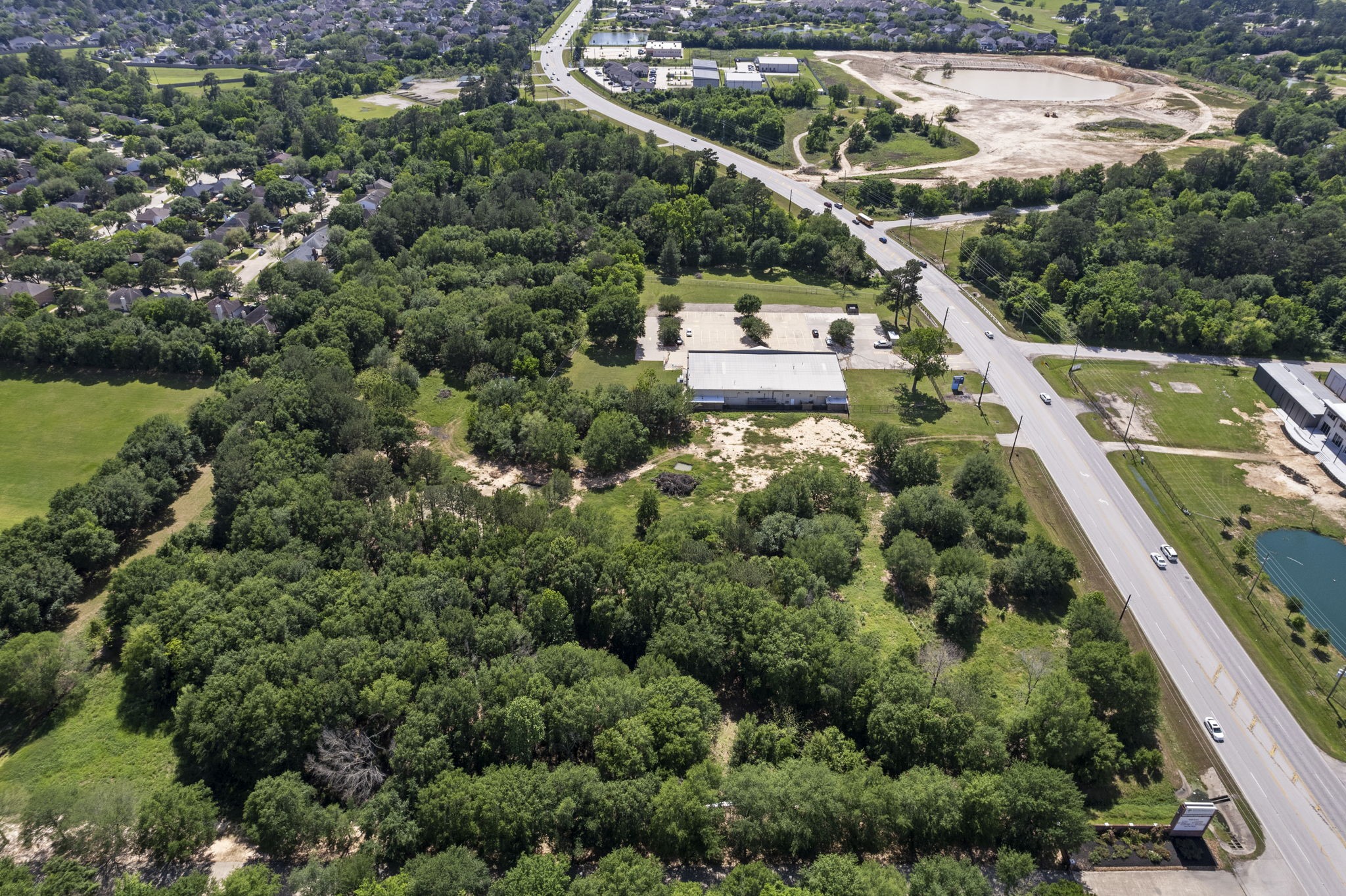 7803 Spring Cypress Road Spring, TX 77379 - Photo 13 of 14 an aerial view of house with yard