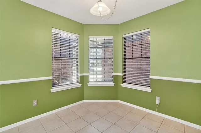 a view of a room with windows