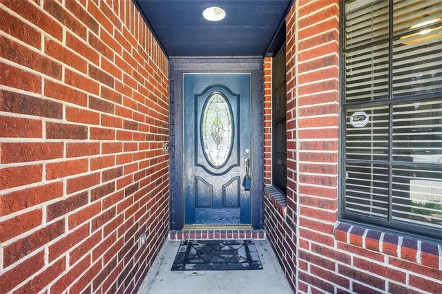 a view of a door with a door and a shower