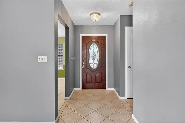 a front view of a house with entrance gate