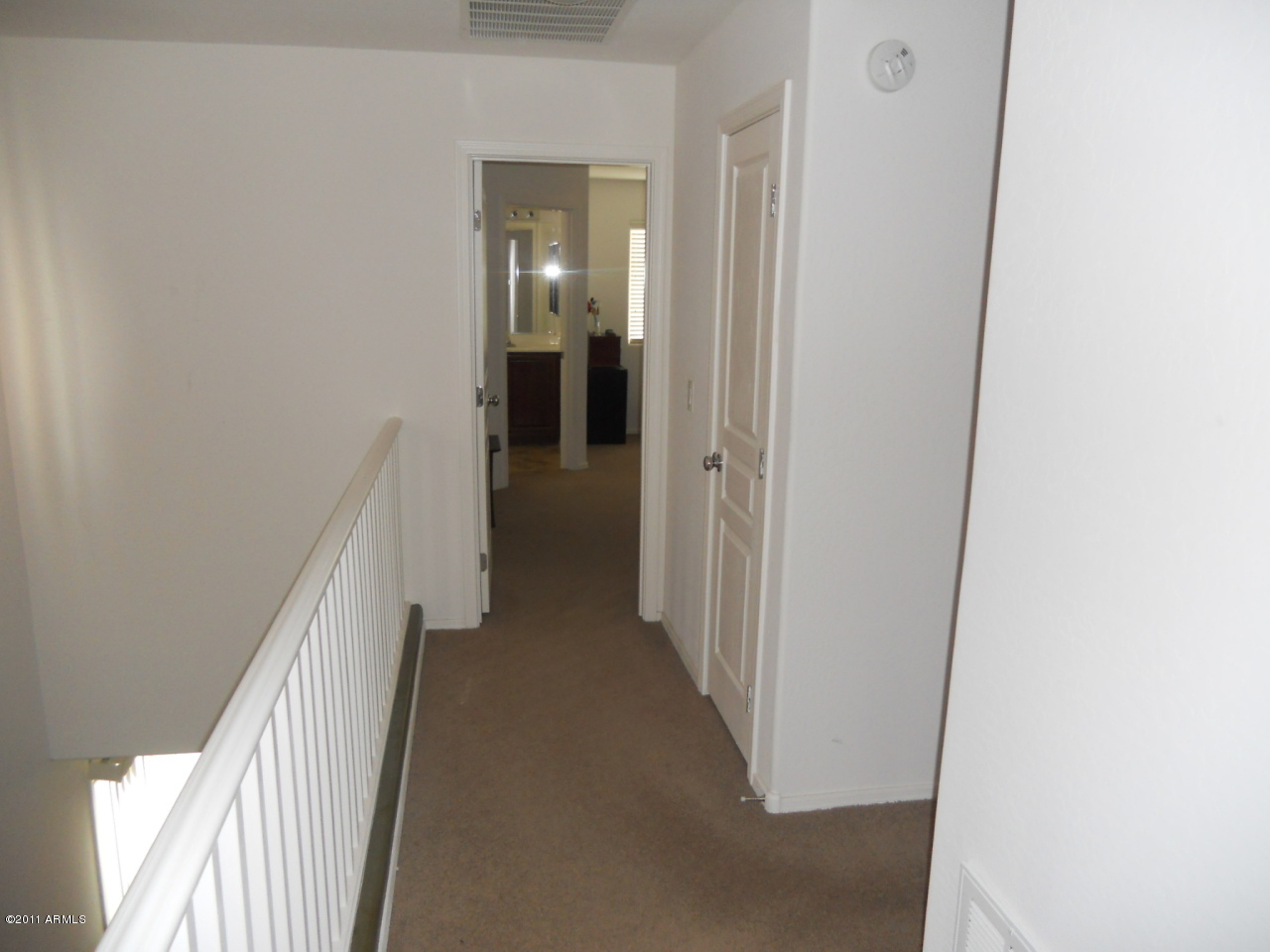 15340 West Wethersfield Road Surprise, AZ 85379 - Photo 9 of 19 Hallway to Master
