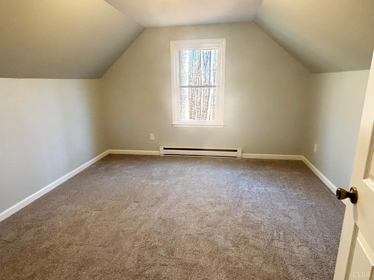 447 Matohe Road Monroe, VA 24574 - Photo 15 of 20 an empty room with a window