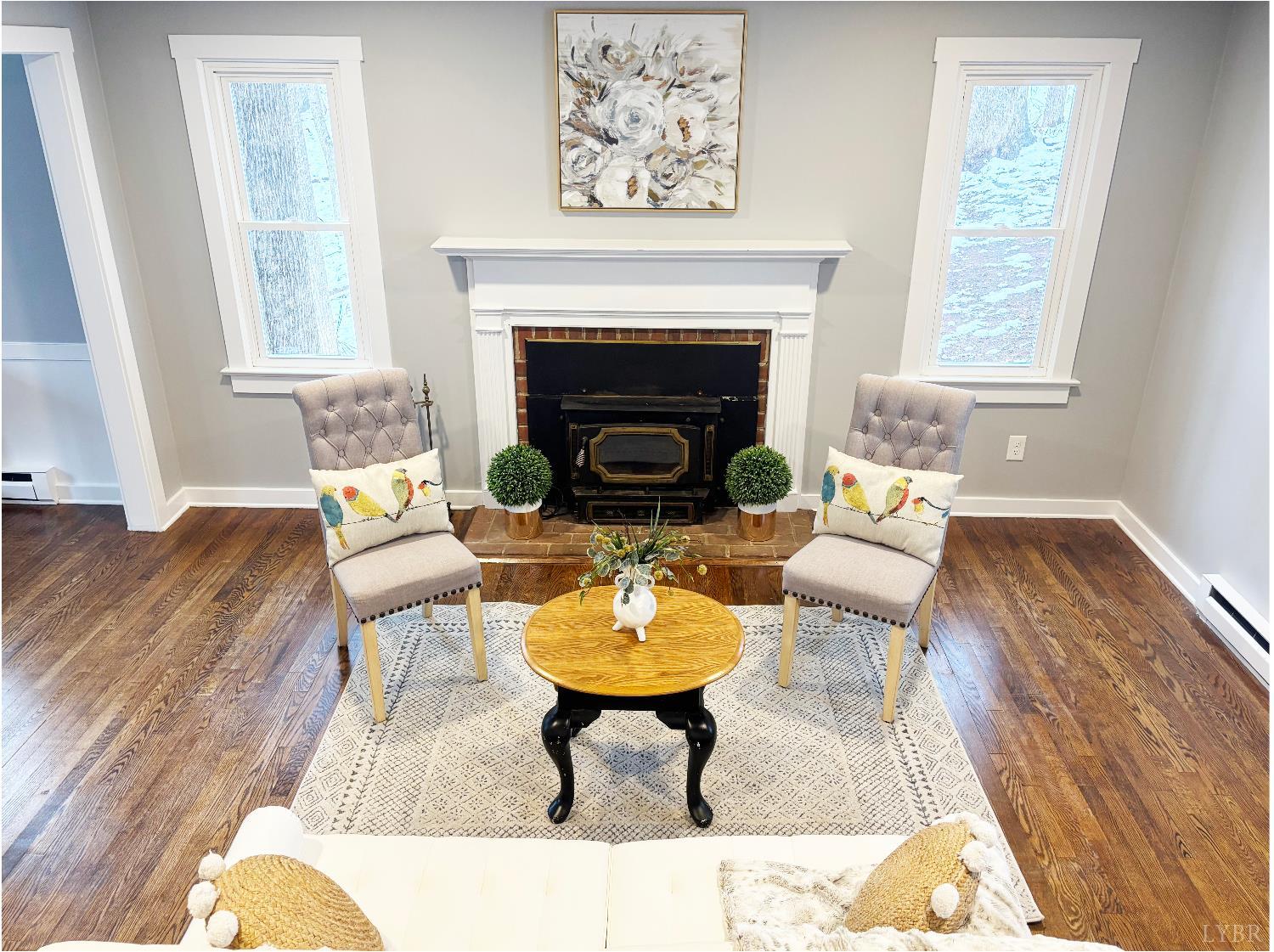 447 Matohe Road Monroe, VA 24574 - Photo 4 of 20 a living room with furniture and a fireplace