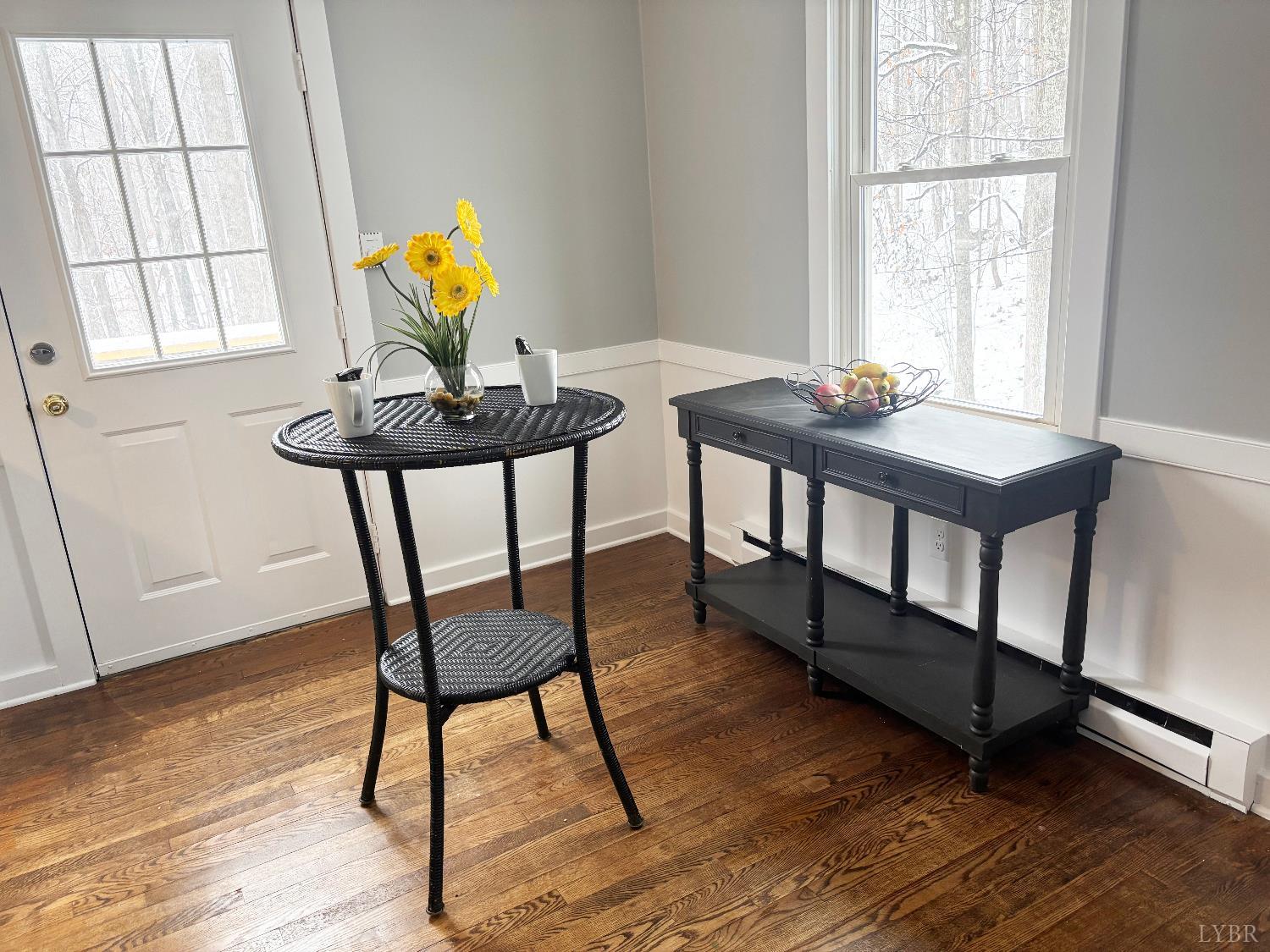447 Matohe Road Monroe, VA 24574 - Photo 8 of 20 a view of a workspace with furniture and window in a room