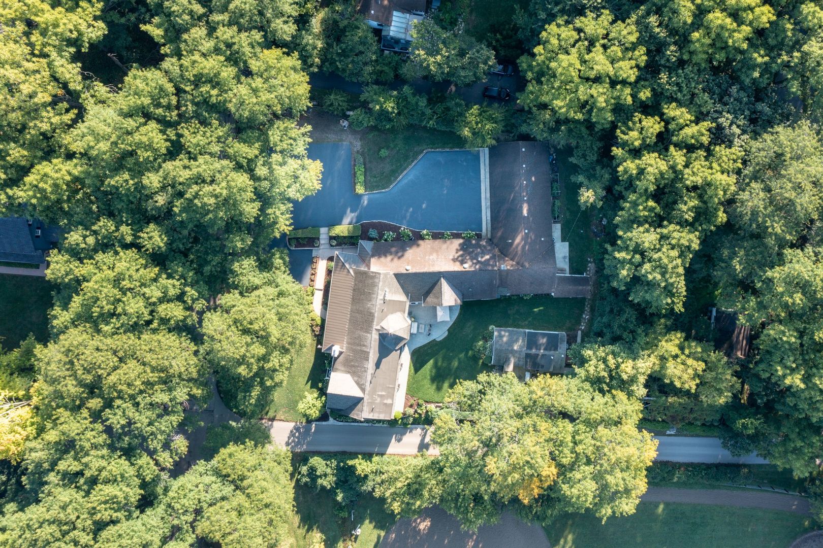 204 Country Commons Road Trout Valley, IL 60013 - Photo 14 of 17 an aerial view of a house with a yard and garden