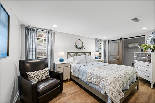 204 Country Commons Road Trout Valley, IL 60013 - Photo 16 of 17 a bedroom with a bed and a couch