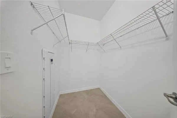 a view of a room with racks on the wall