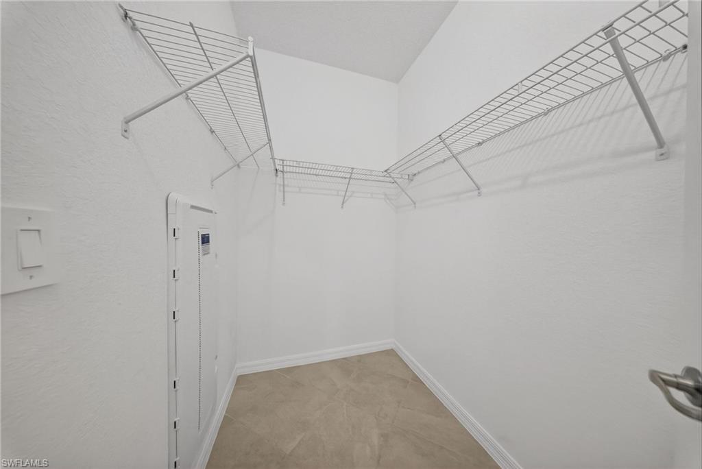2224 Dragonfruit Way Naples, FL 34120 - Photo 14 of 33 View of walk in closet
