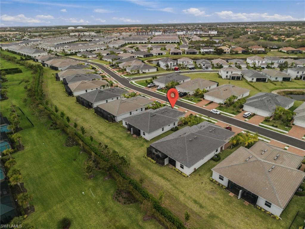 2224 Dragonfruit Way Naples, FL 34120 - Photo 32 of 33 Aerial overview of property's location with nearby suburban area