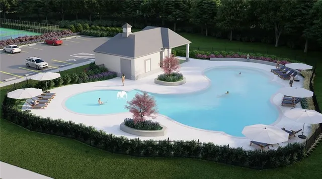 an aerial view of a house with outdoor space