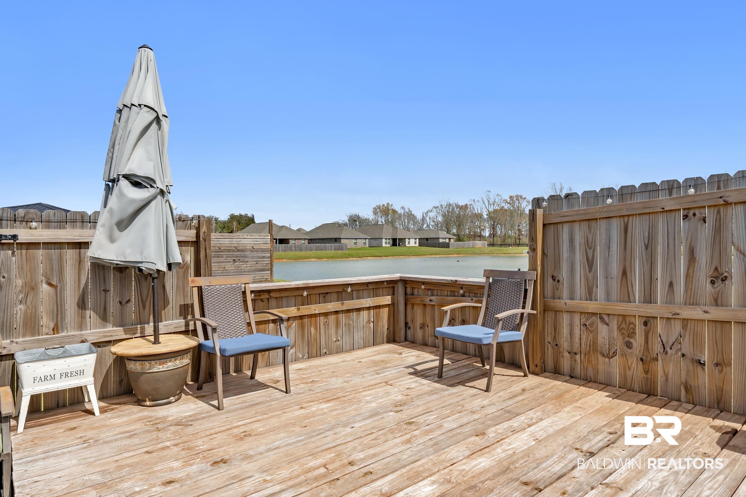 1176 Stella Road Foley, AL 36535 - Photo 36 of 40 Deck with a residential view and a water view