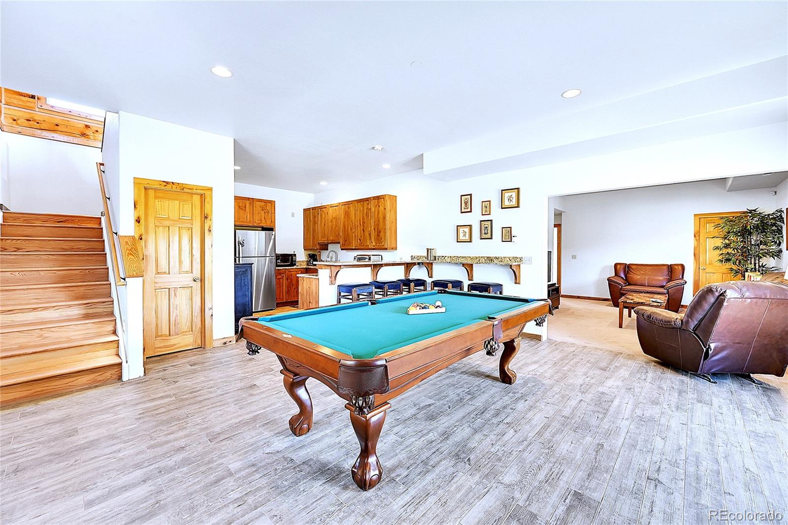 278 Clark Road Bailey, CO 80421 - Photo 23 of 44 a room with furniture pool table wooden floor and windows