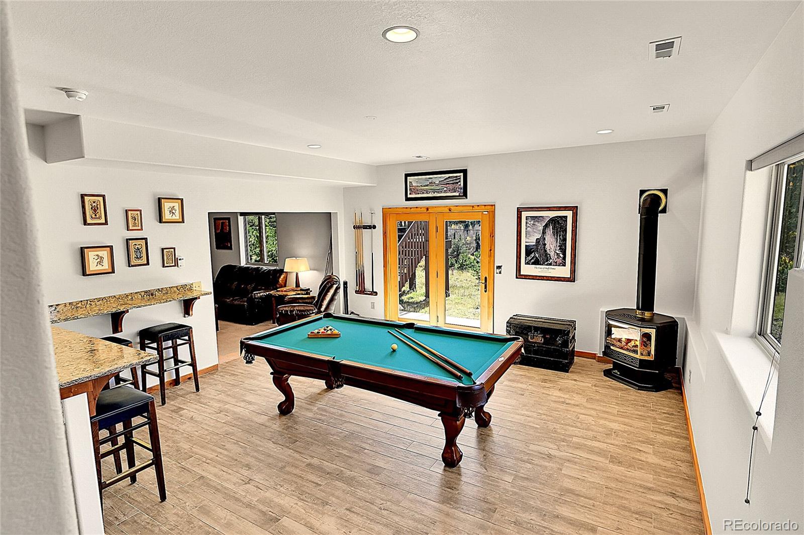 278 Clark Road Bailey, CO 80421 - Photo 28 of 44 a room with furniture pool table and flat screen tv