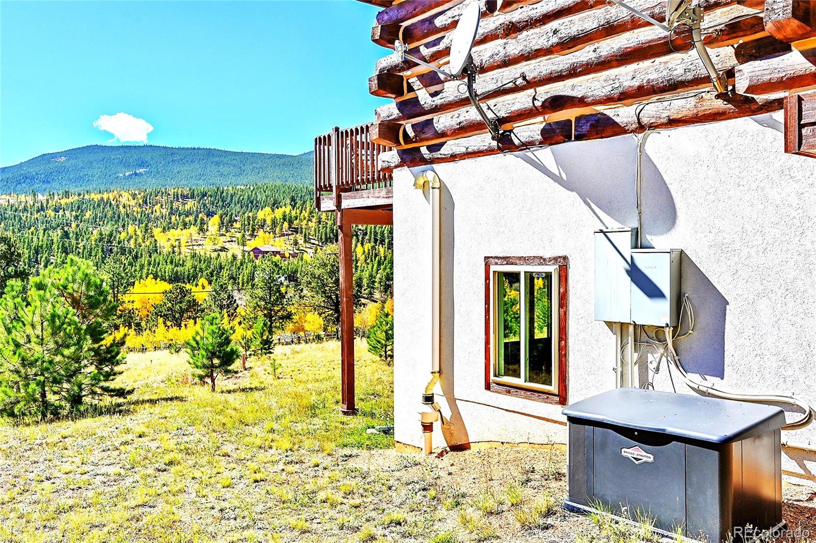 278 Clark Road Bailey, CO 80421 - Photo 6 of 44 a view of a house with a outdoor space