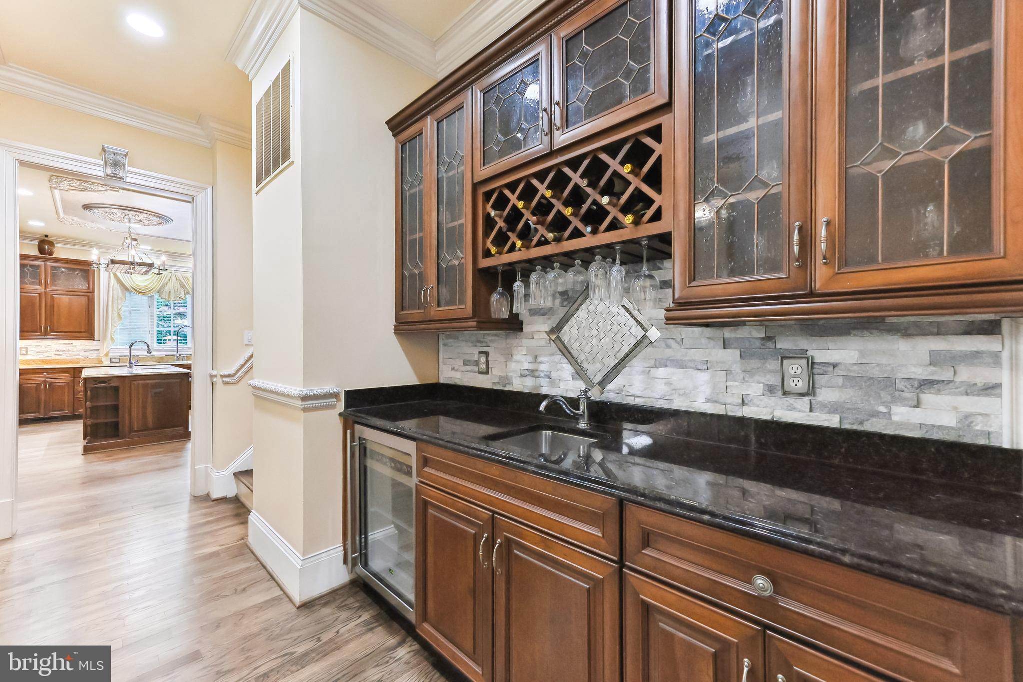 12792 Yates Ford Road Clifton, VA 20124 - Photo 33 of 117 Butler's Pantry with Wine Rack, Sink , Fridge.