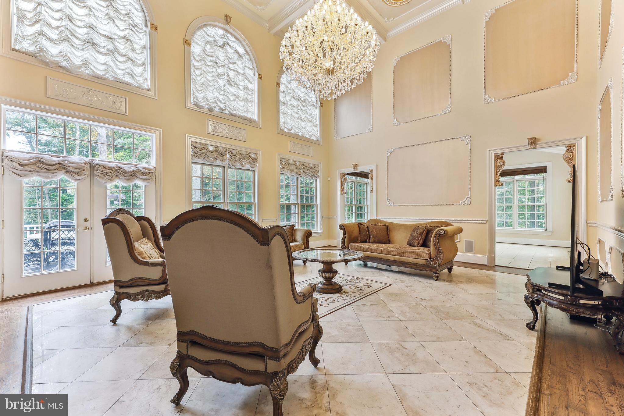 12792 Yates Ford Road Clifton, VA 20124 - Photo 34 of 117 Walls of Windows, Travertine Floors with Inset