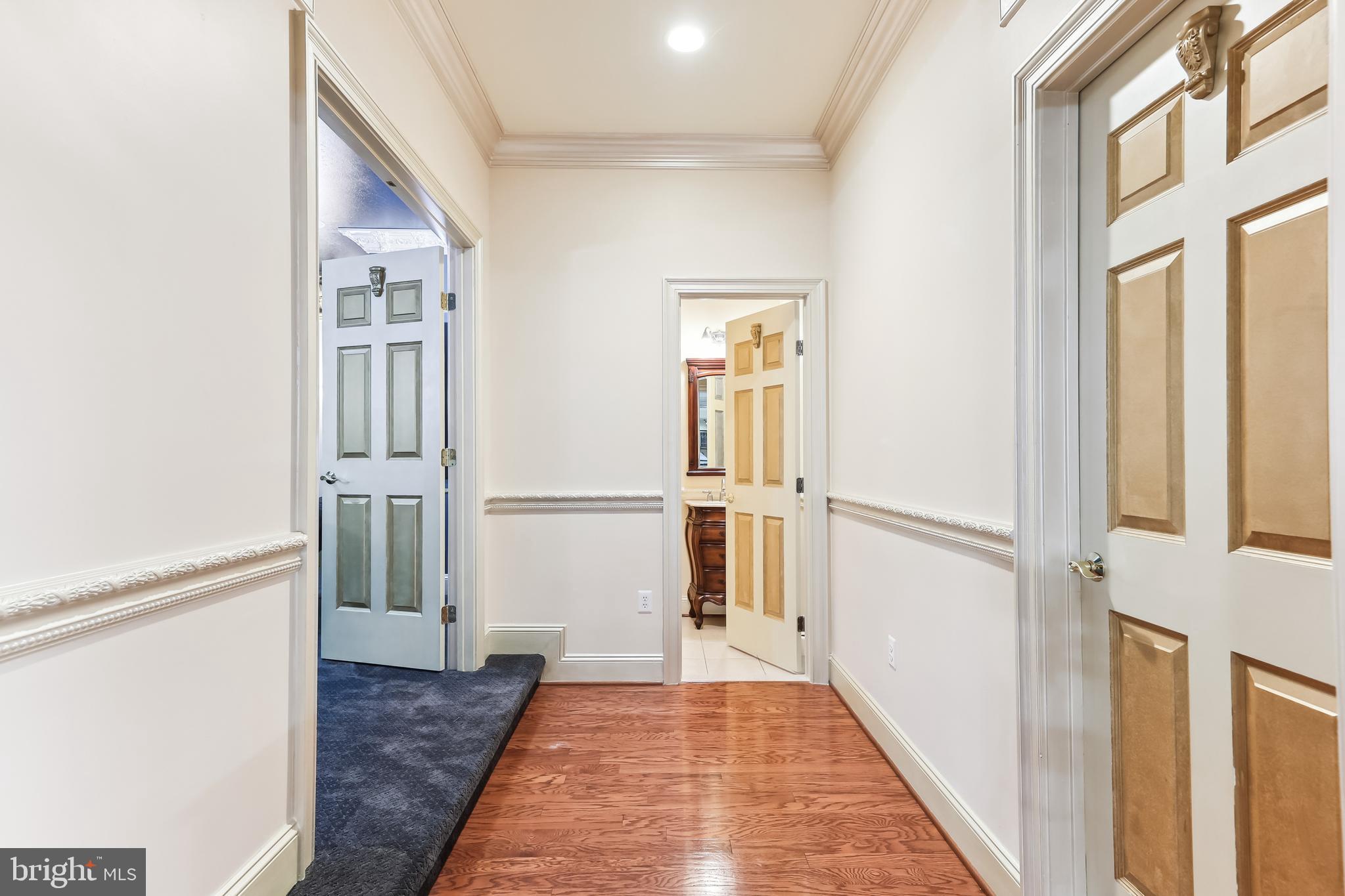 12792 Yates Ford Road Clifton, VA 20124 - Photo 76 of 117 Hallway to Powder Room and Home Theater