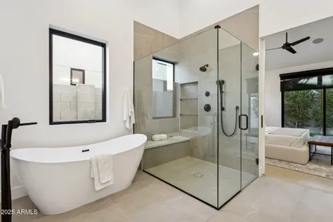 a bathroom with a shower and toilet
