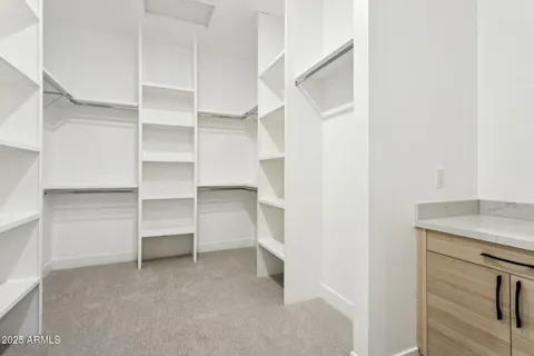 a spacious bathroom with a tub shower and view
