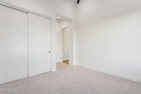 a bathroom with a double vanity sink mirror double and bathtub